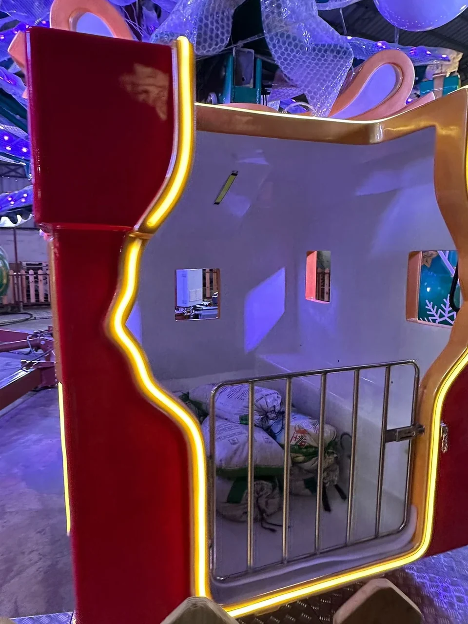 Cabin with gold trim and lighting strip being assembled
