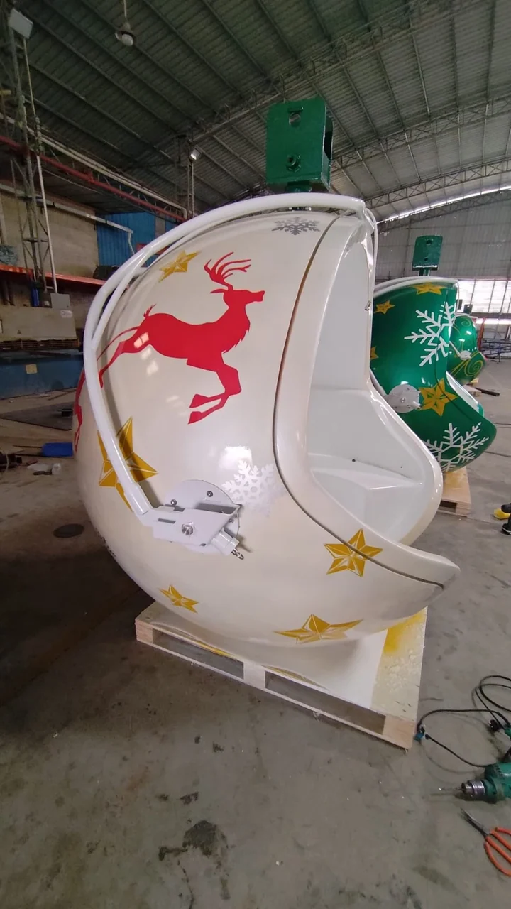 White cabin with a reindeer graphic during finishing